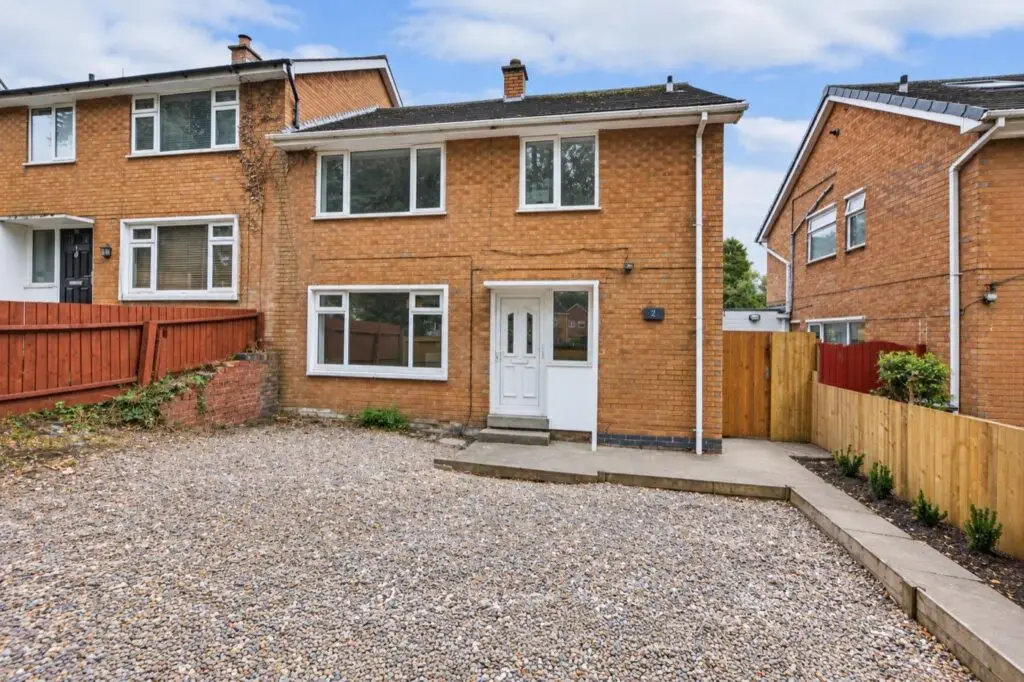 Front of the refurbished Gedling property with new fencing and gravelled frontage